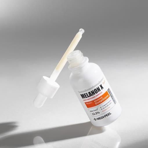 MEDIPEEL Melanon X Ampoule Light – 30ml  Brightening & Radiance-Boosting Serum with 13.5% Melatamine™ 7, Retinol & Vitamin C MEDIPEEL Melanon X Ampoule Light - 30ml - Glam Global UKMEDIPEEL
