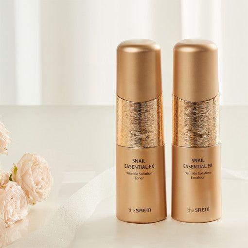 The SAEM Snail Essential EX Wrinkle Solution Emulsion 150ml | Hydration & Anti - Aging Care - Glam Global UKThe SAEM